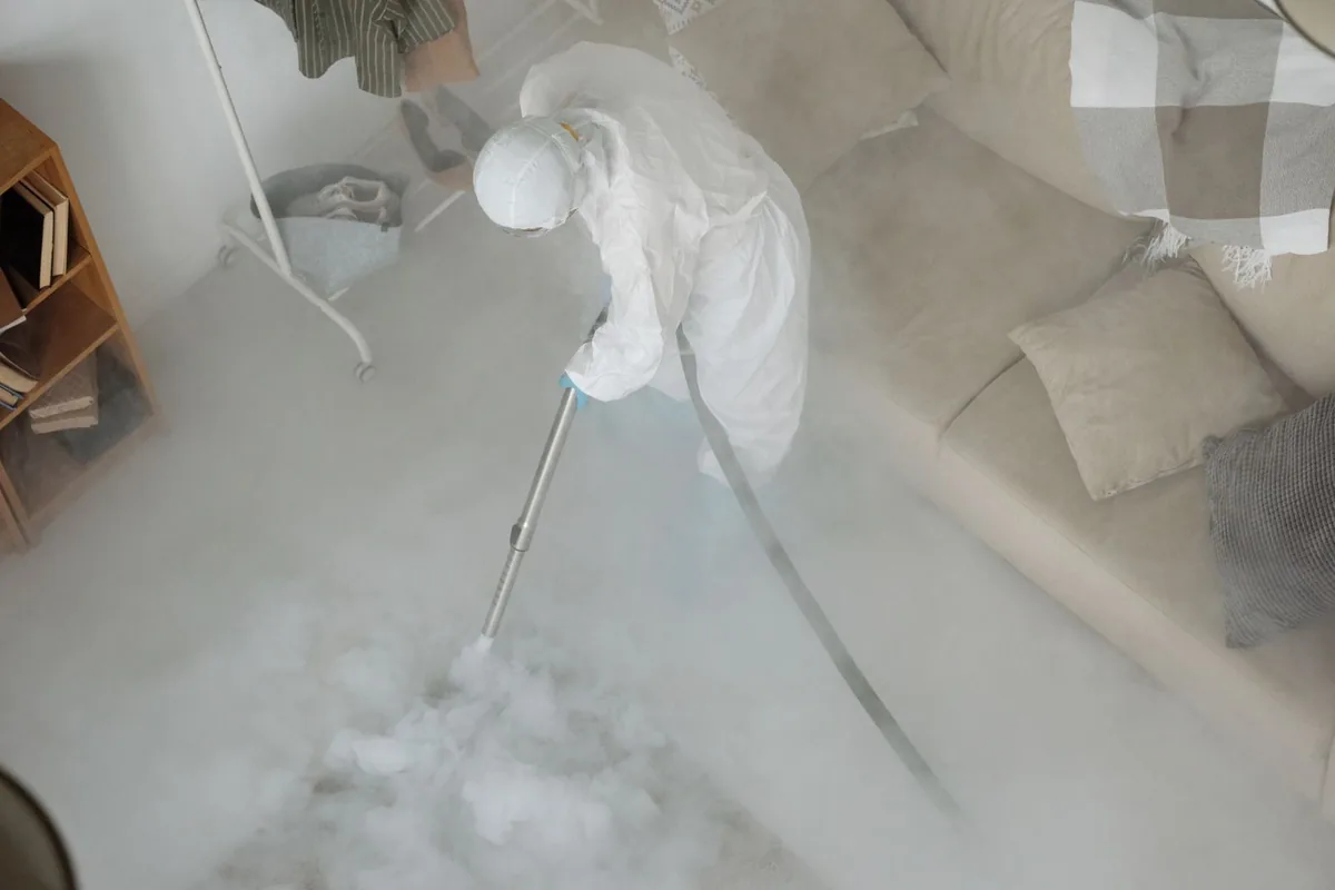Biohazard cleanup technician in protective equipment, Morse, LA